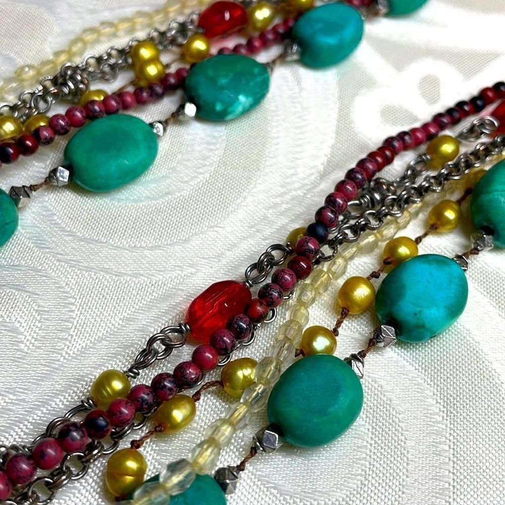 Multi-strand faux turquoise, red, yellow pearl, and neutral tone necklace
